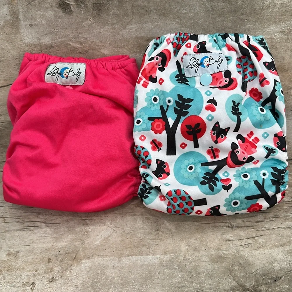 Lalabye Baby, one size cloth diapers reusable. Pair, one print one solid. *USED*